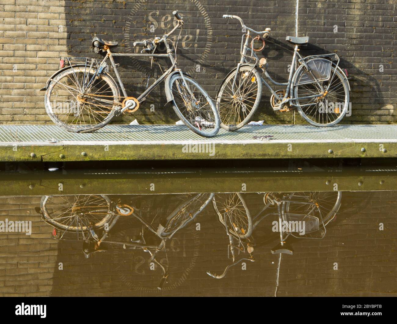 Two rusted bicycles Stock Photo