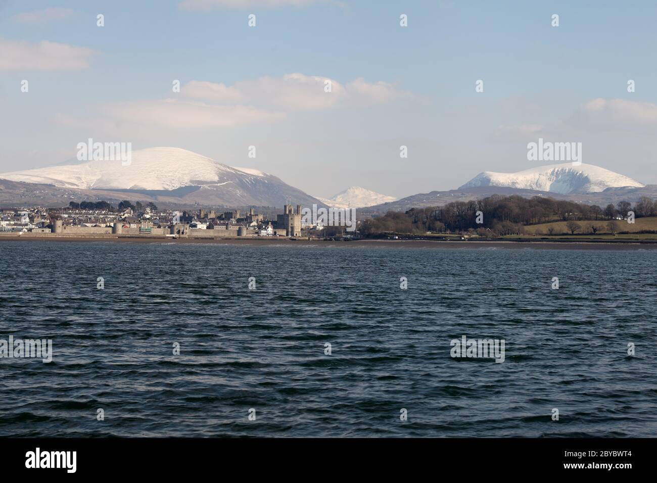 caernarfon from the menai strait Stock Photo Alamy