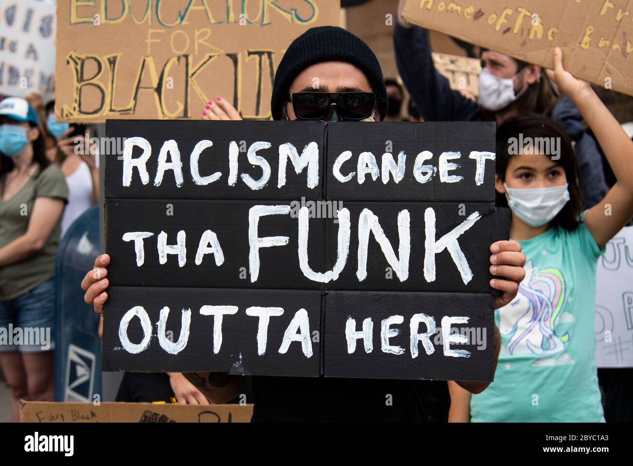 Protestors carry signs during peaceful protest in Los Angeles honoring George Floyd Stock Photo