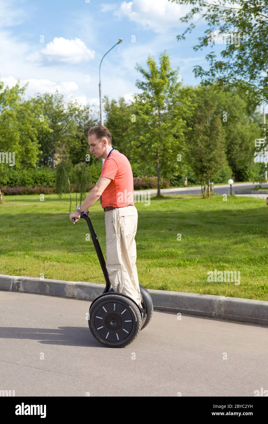 Man electric scooter hi-res stock photography and images - Alamy