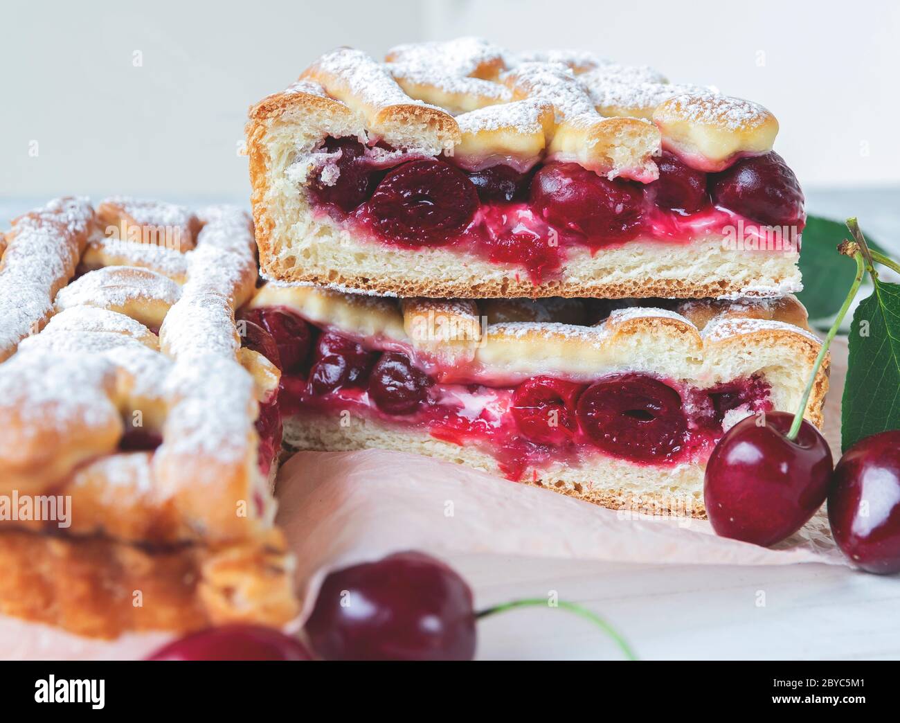 Tasty homemade cherry pie sweet on rustic wooden white background ...