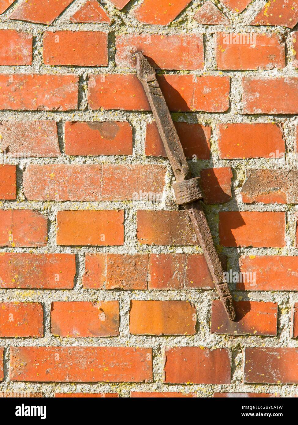 Old rusty clamp in a brick wall hires stock photography and images Alamy