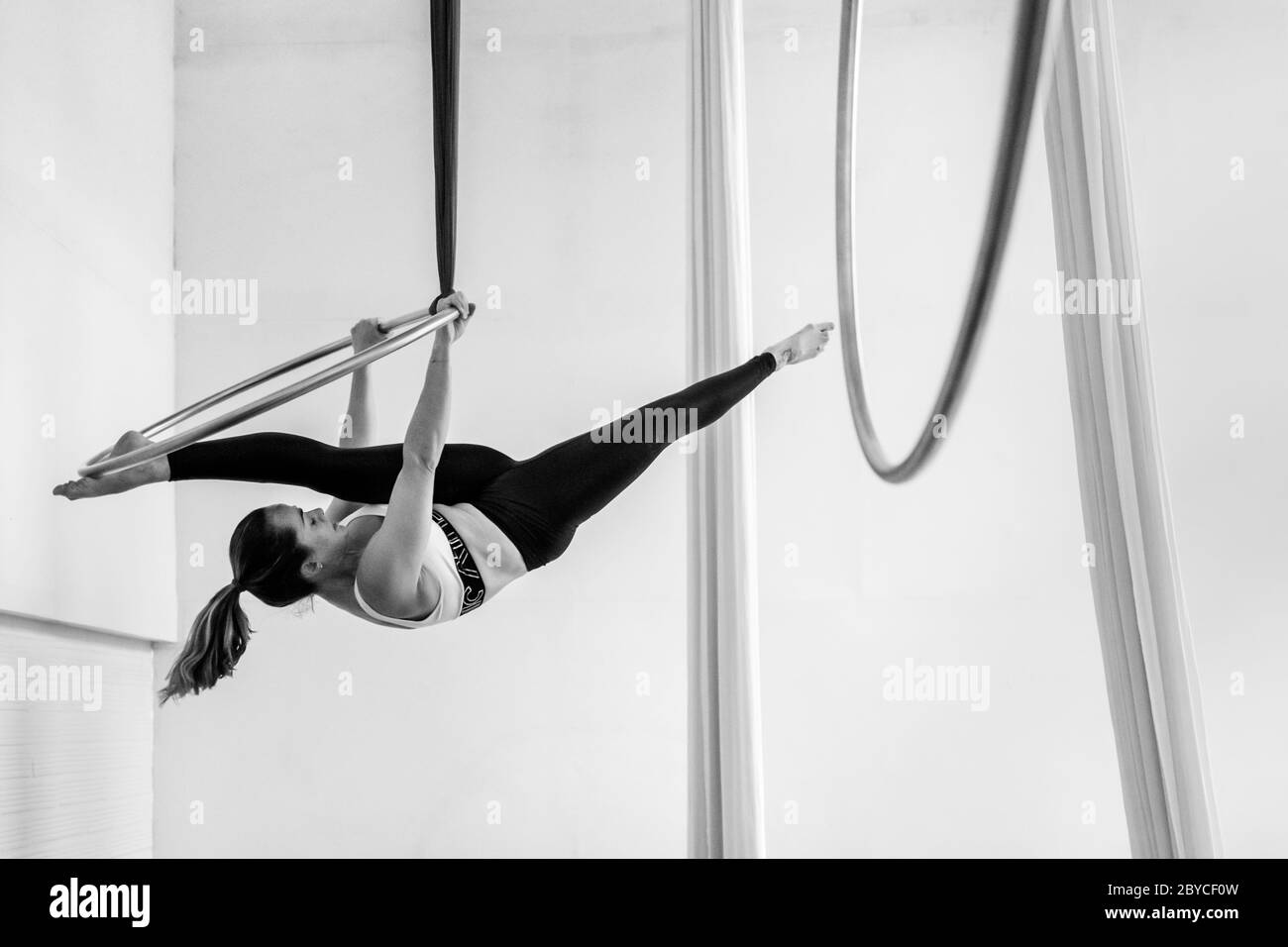 A Colombian Aerial Dancer Performs On Aerial Hoop During A Training Session In A Gym In Medellín