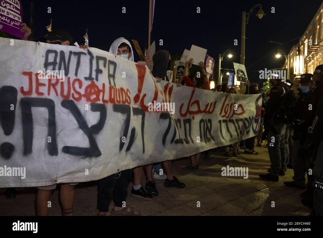 Jerusalem, Israel. 9th June, 2020. Left-wing activists attending a protest in Jerusalem on June 9, 2020 against the killing of Iyad Hallak, a disabled Palestinian man shot dead by Israeli police as well of the killing of unarmed African-American George Floyd. Credit: Eddie Gerald/Alamy Live News Stock Photo