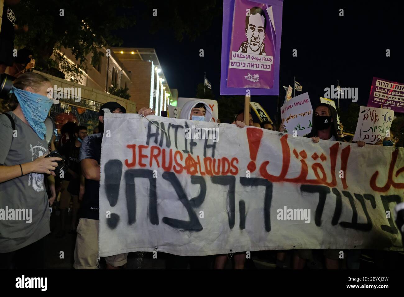 Jerusalem, Israel. 9th June, 2020. Left-wing activists attending a protest in Jerusalem on June 9, 2020 against the killing of Iyad Hallak, a disabled Palestinian man shot dead by Israeli police as well of the killing of unarmed African-American George Floyd. Credit: Eddie Gerald/Alamy Live News Stock Photo