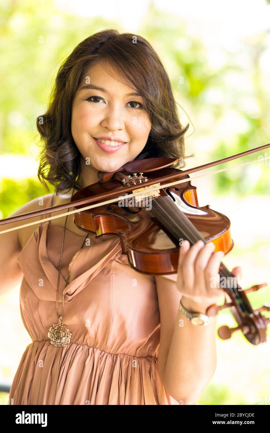 Female asian violinist hires stock photography and images Alamy