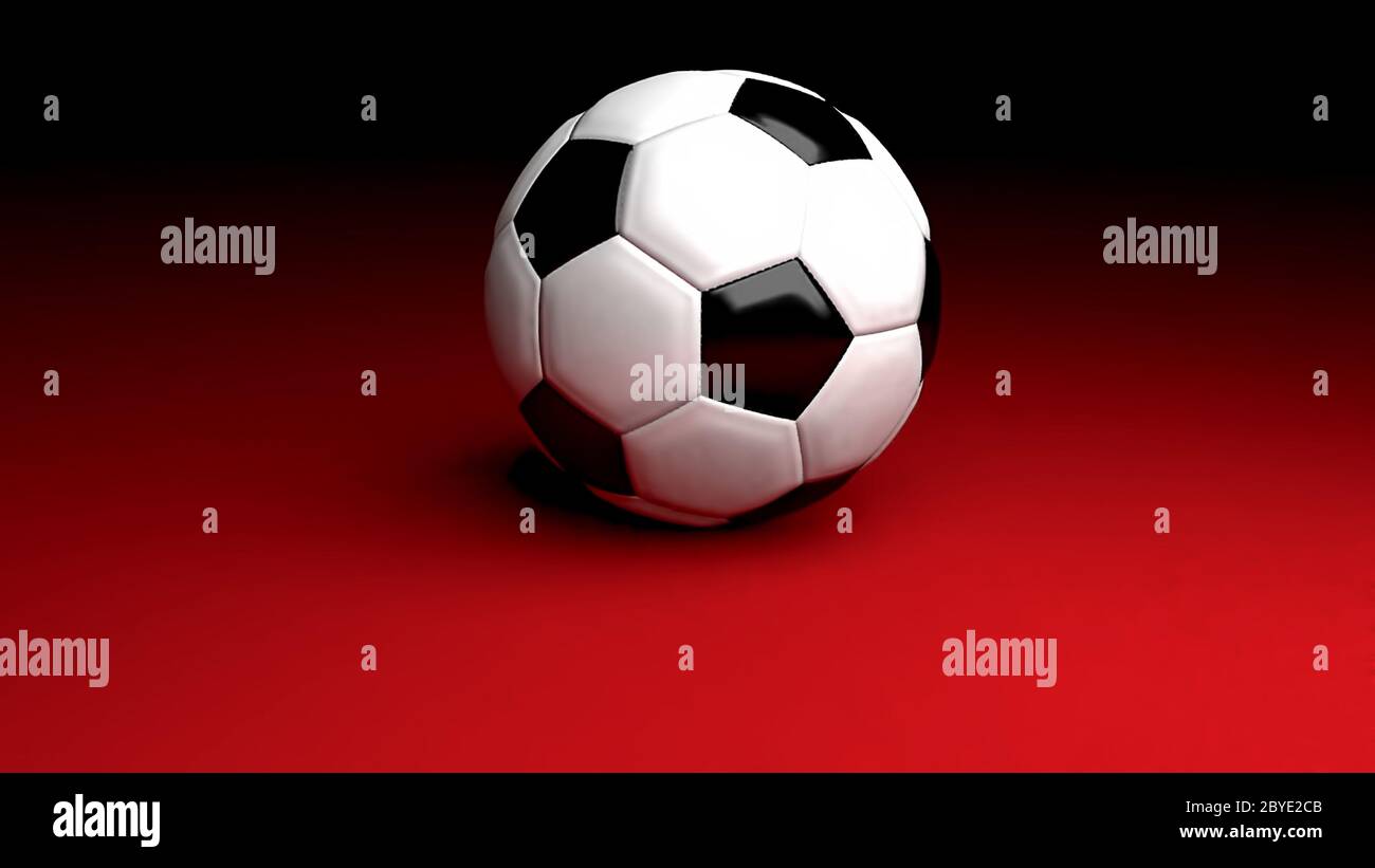 Realistic 3d illustration of a football/soccer ball on a red-colored floor. Stock Photo