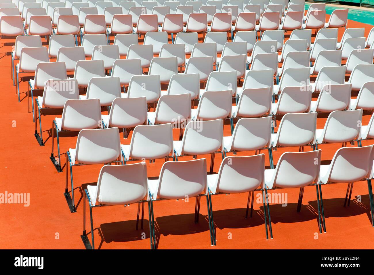 Empty rows of seats backs to spectator Stock Photo