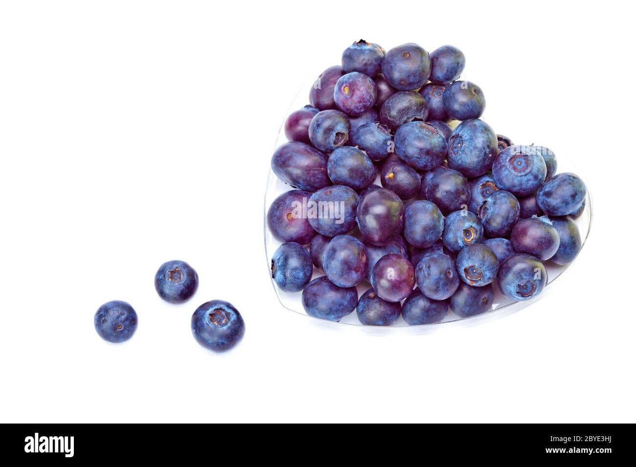 Berries of a bilberry formed into a heart shape Stock Photo Alamy