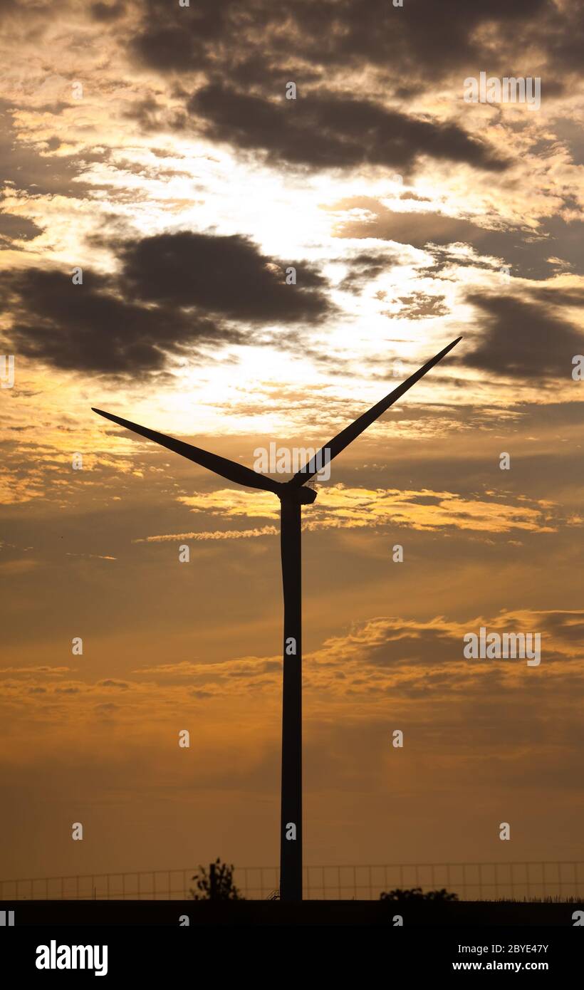 Silhouette of wind turbines Stock Photo - Alamy