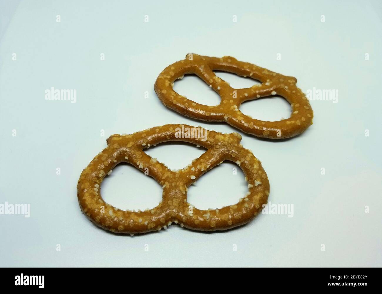 Salted pretzels on a white isolated background Stock Photo