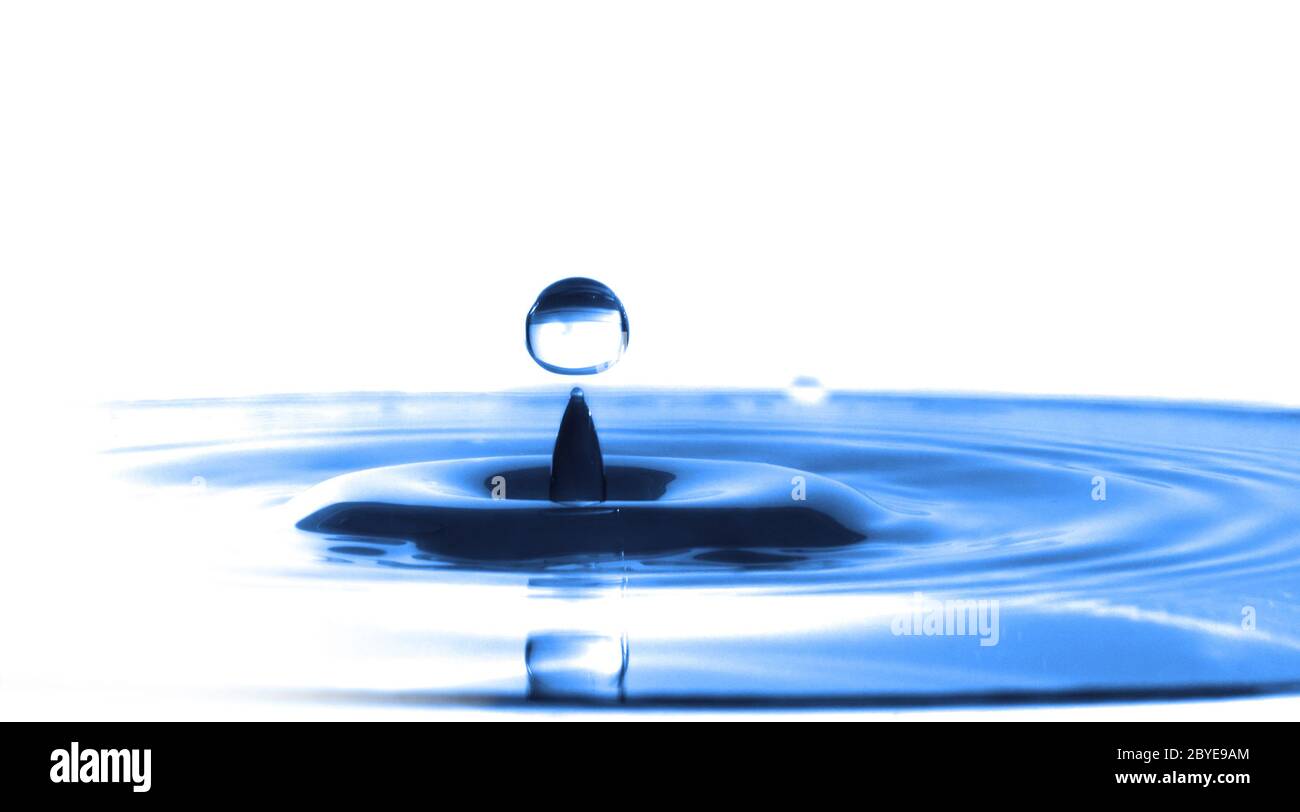 Blue Water Drop Splashing with Waves Stock Photo