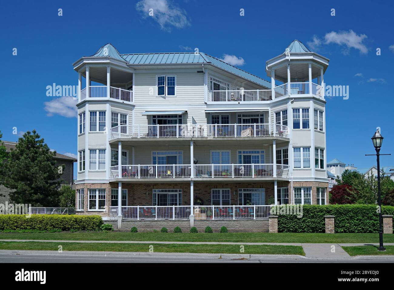 small  low rise apartment building with large balconies Stock Photo