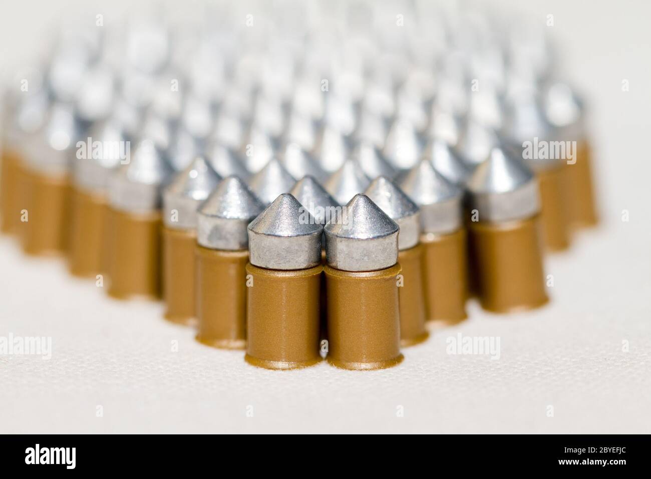 Gun bullets over white background Stock Photo