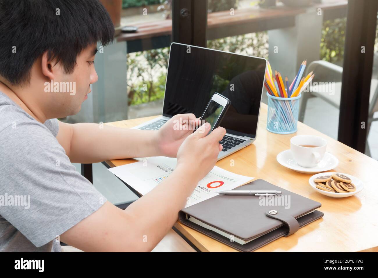 Work from home,Businessman working remotely from home. Using computer