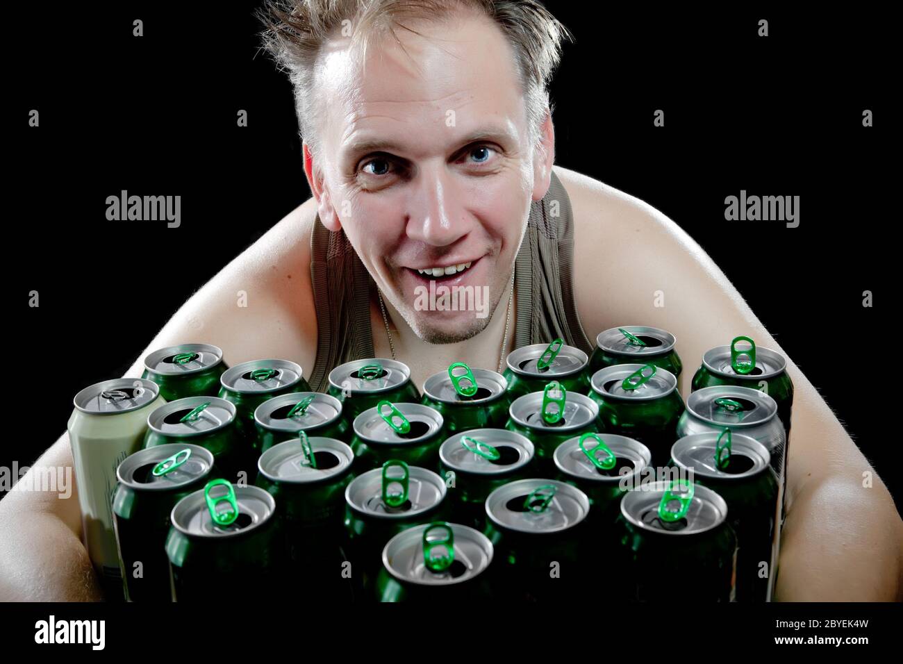 drunk man and is a lot of empty beer cans Stock Photo Alamy