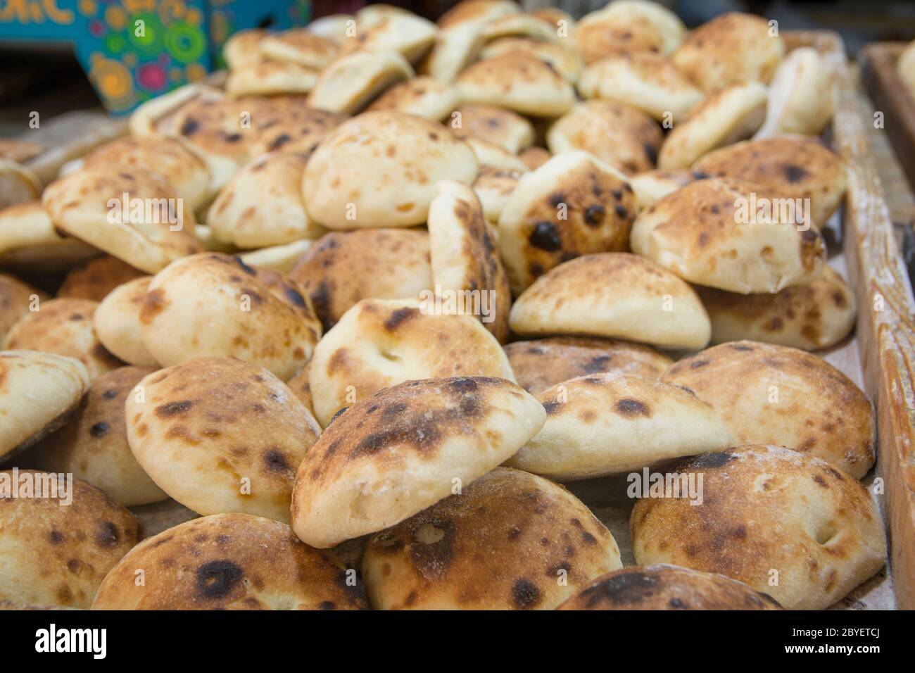 Pile of typical pita bread for sale, in the Mahane Yehuda market, Jerusalem, Israel Stock Photo