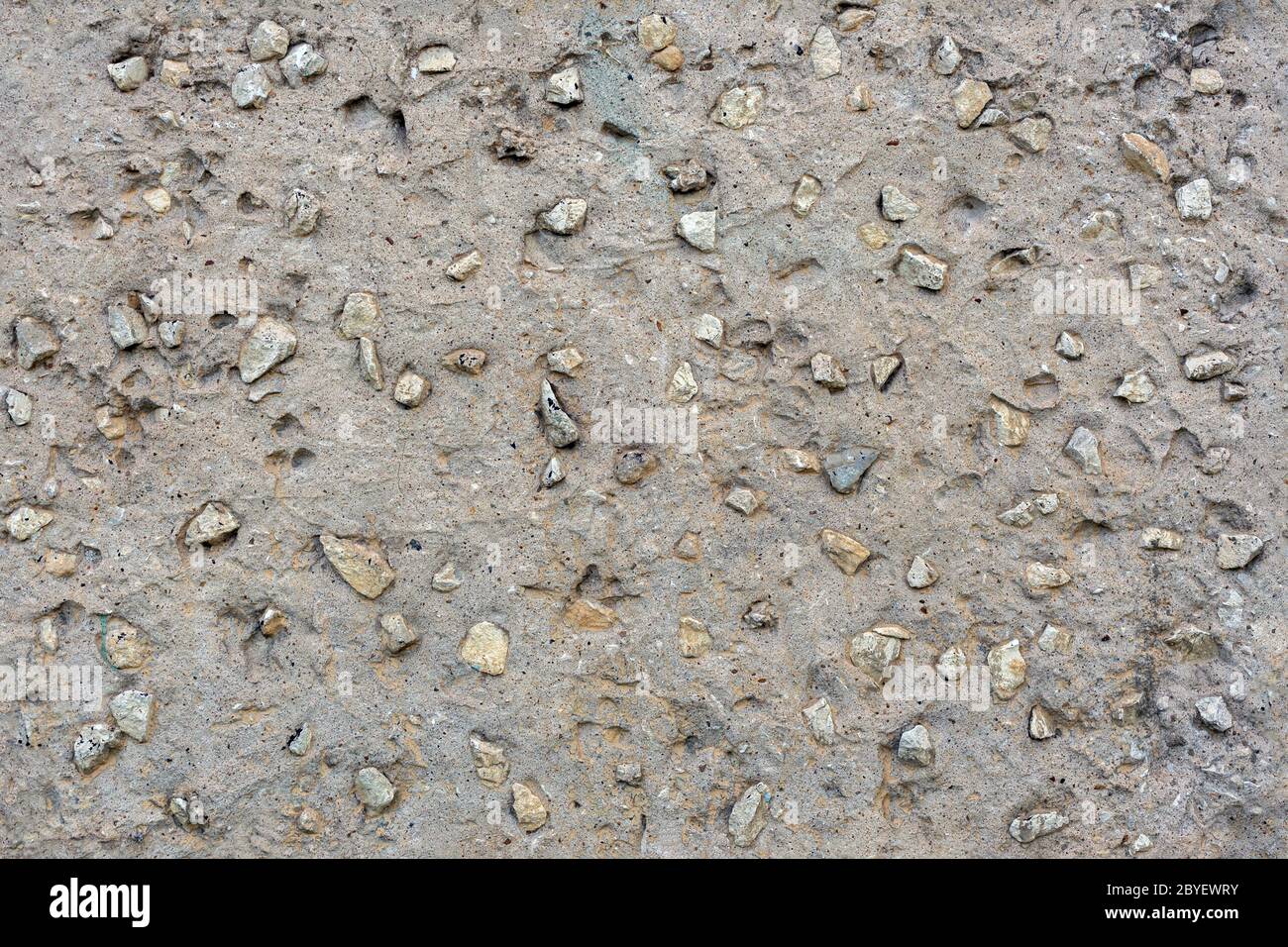 seamless flat concrete with rocks - grey texture and background Stock Photo