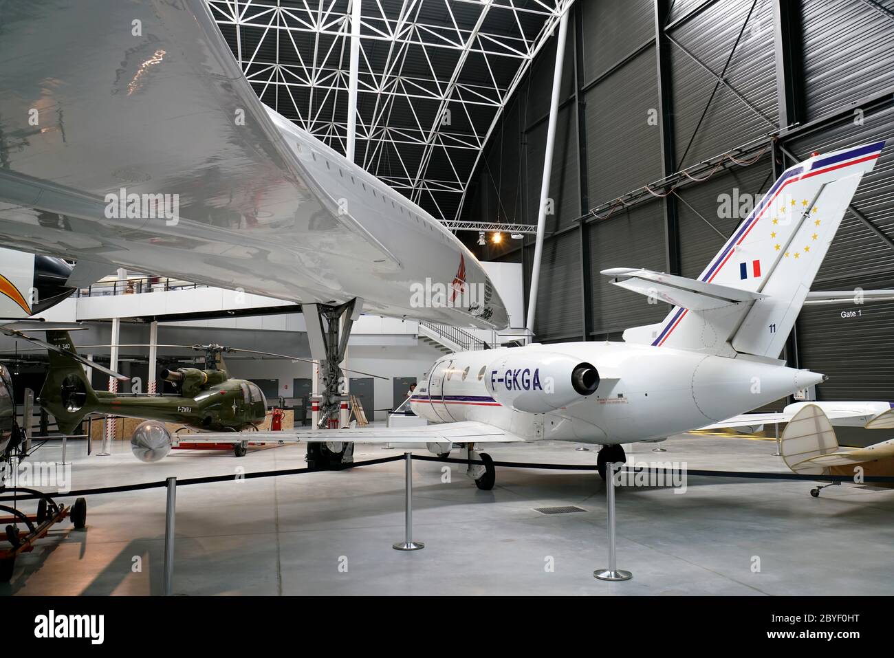An Aerospatiale/BAC Concorde 100 with an Aerospatiale Corvette  business jet display in Musee Aeroscopia Museum.Blagnac.Haute-Garonne.Occitanie.France Stock Photo