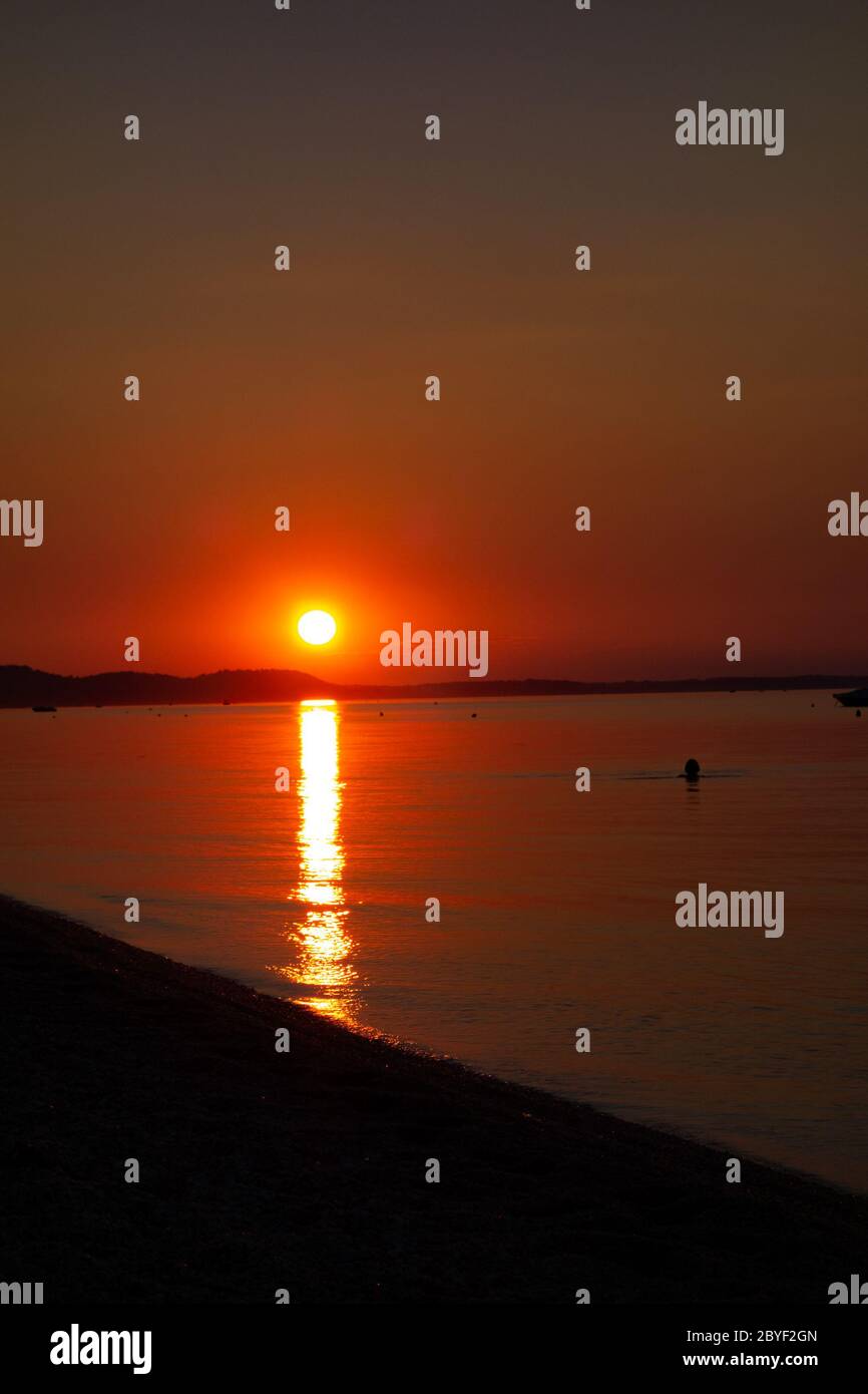 Beautiful Sunset at the beach Stock Photo - Alamy