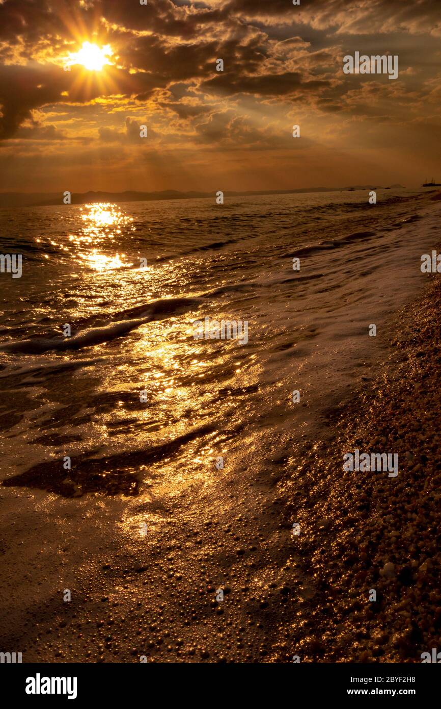 Beautiful Sunset at the beach Stock Photo - Alamy