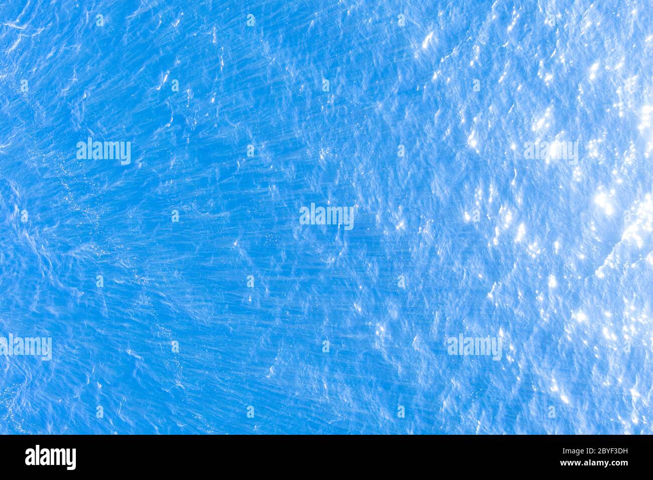 Aerial view of a crystal clear sea water texture. View from above ...
