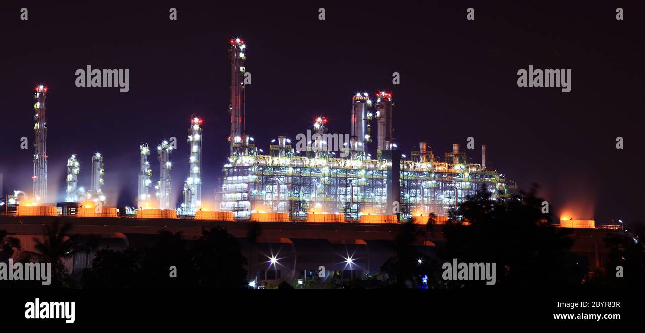 Panoramic view of oil refinery factory at night Stock Photo