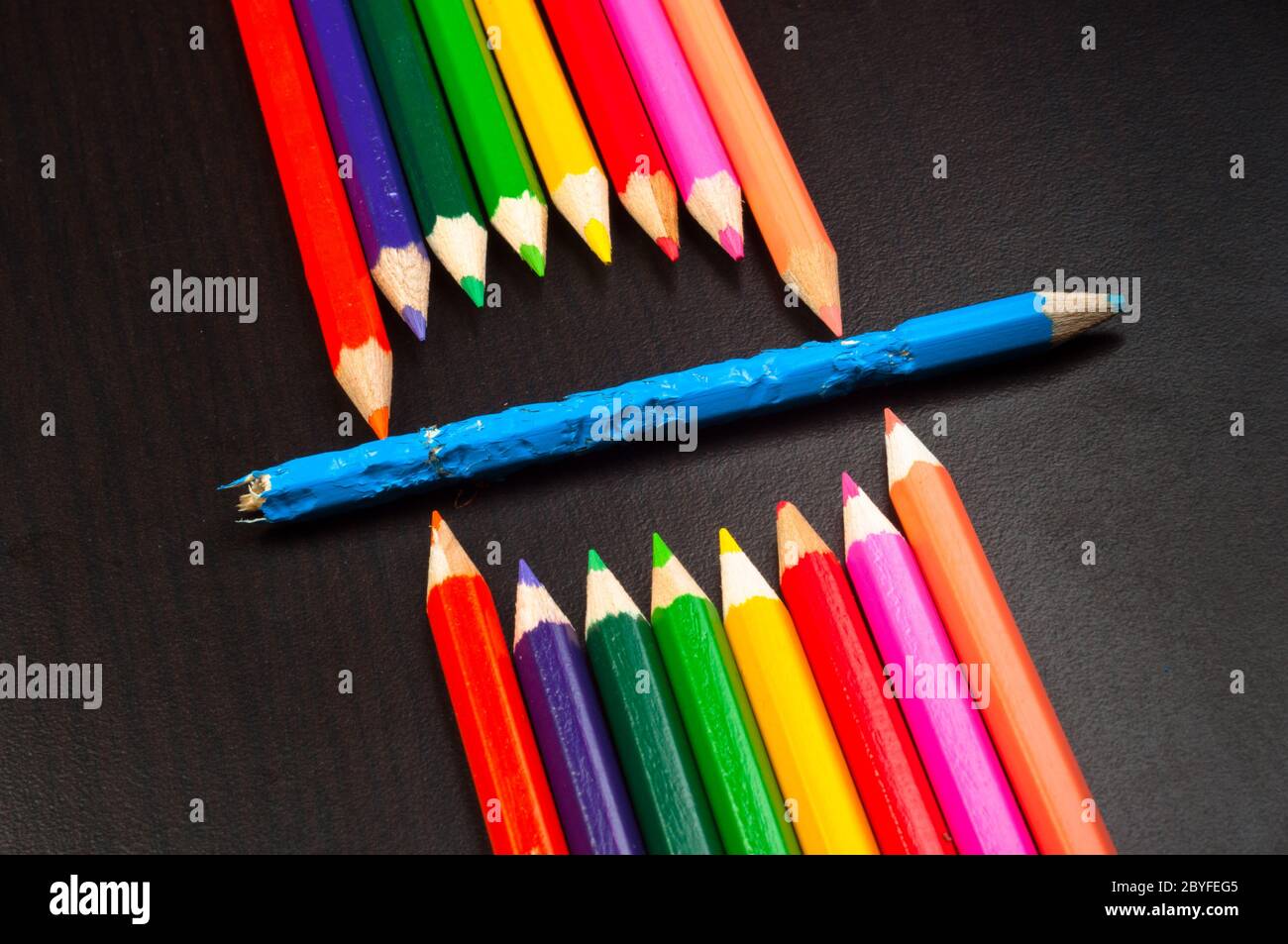 Monster made out of pencils on black board Stock Photo Alamy