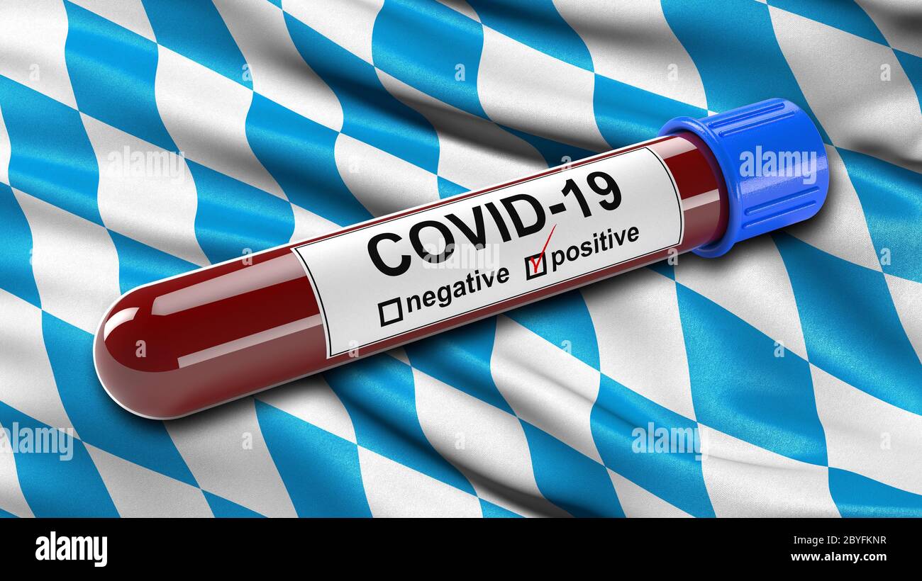 Flag of Bavaria waving in the wind with a positive Covid-19 blood test tube. Stock Photo