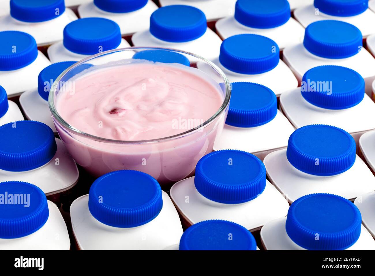 Numbers of yogurt bottles with dark blue covers An Stock Photo Alamy