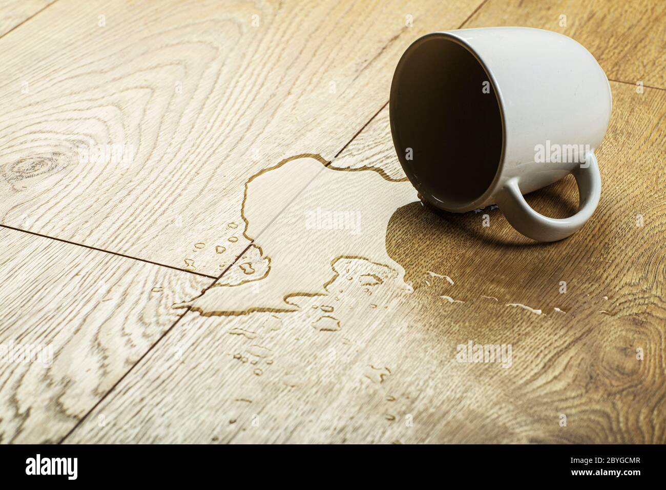 Laminate background.. Wooden laminate and parquet board with spilled water. Moisture protection