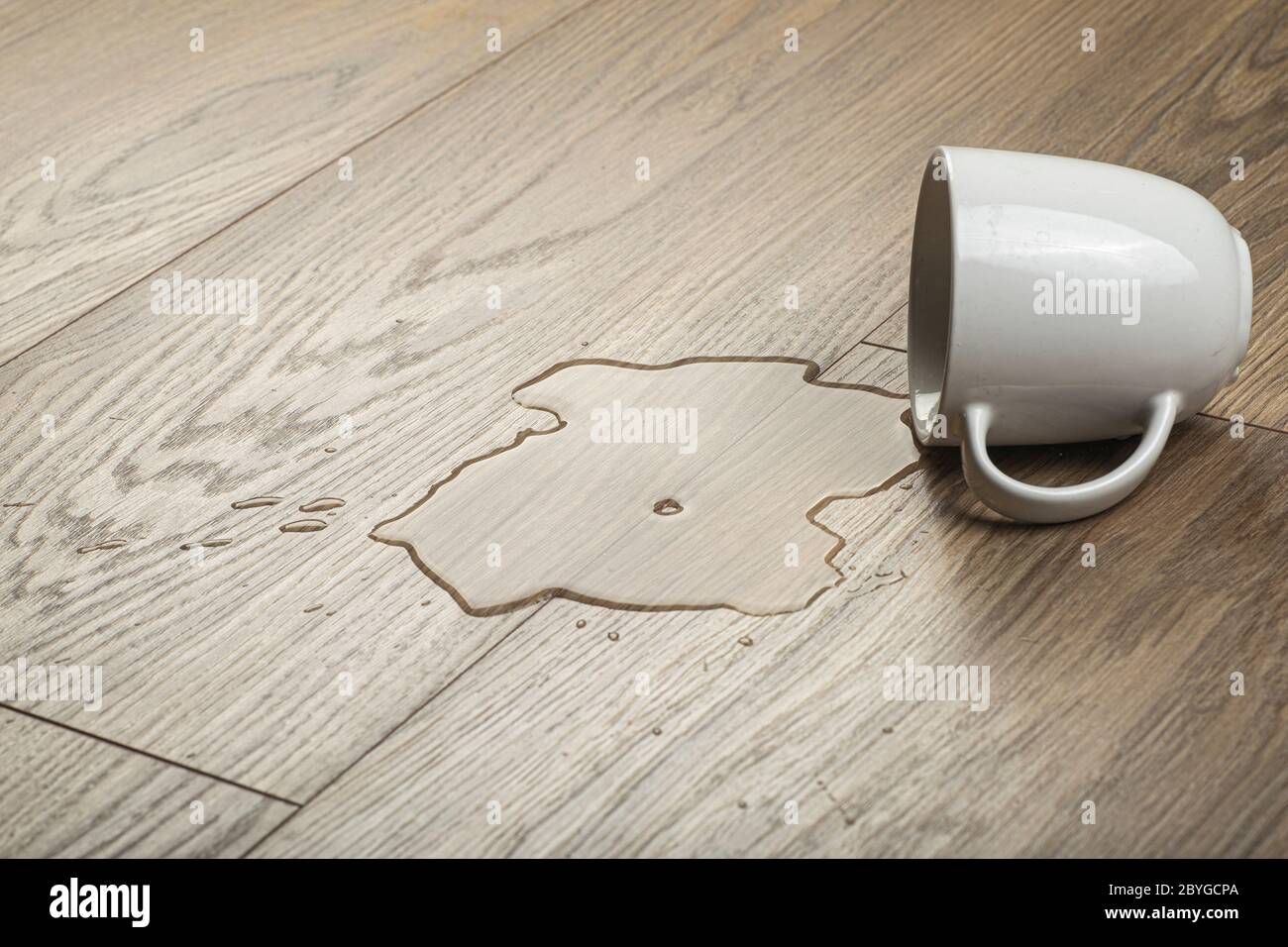 Laminate background.. Wooden laminate and parquet board with spilled