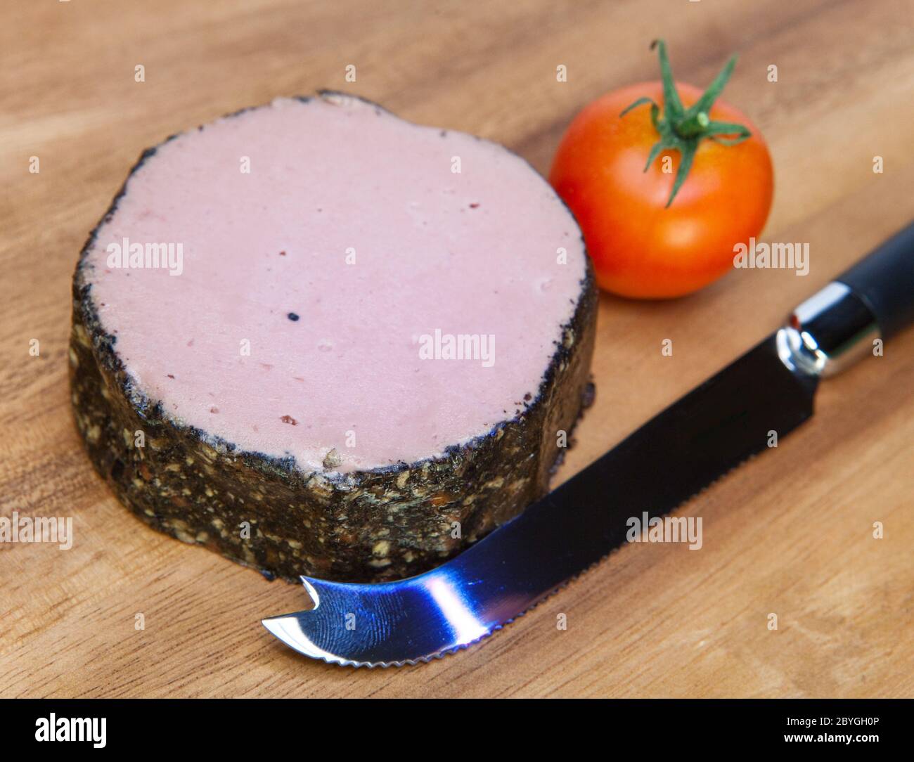 Round meat paste and paste knife Stock Photo Alamy