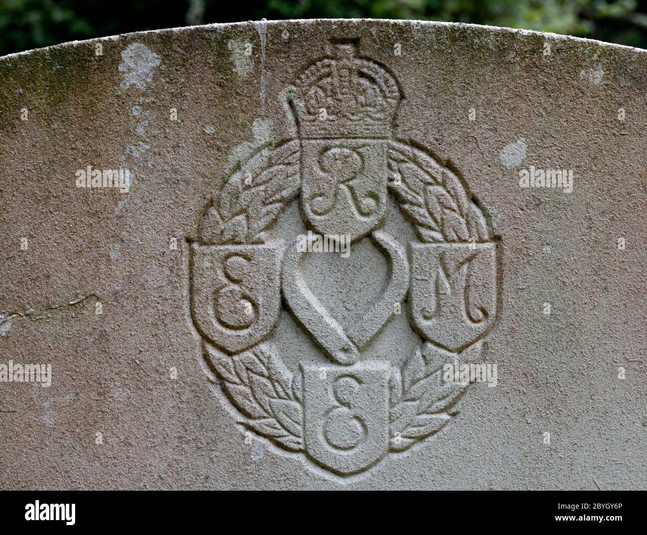R.E.M.E. crest on a war grave, UK Stock Photo