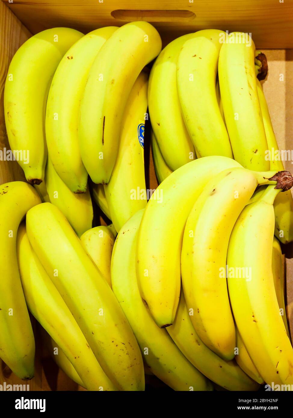 Germany - bananas lie in a wooden box. Deutschland - Bananen liegen in einer Holzkiste. Stock Photo