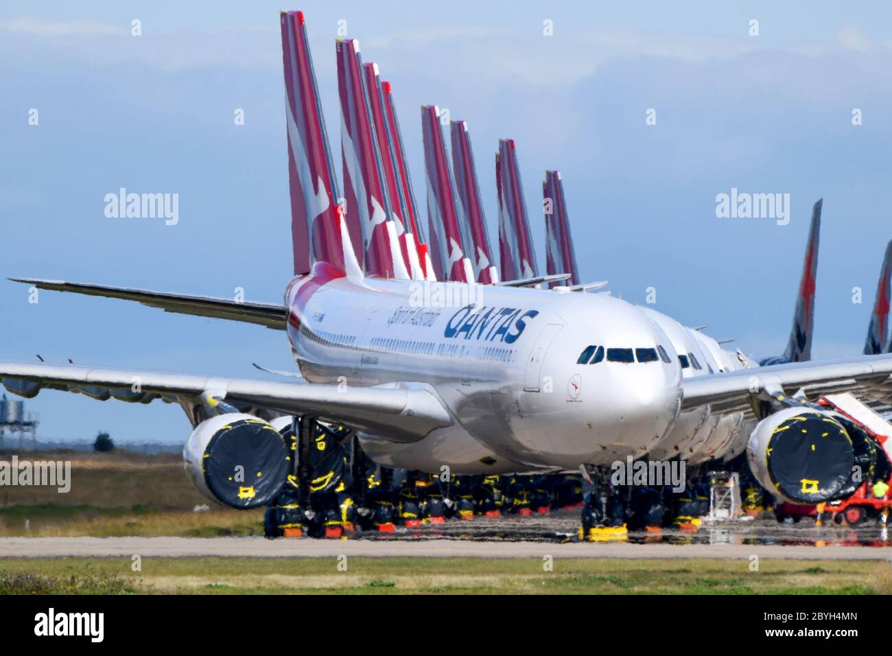 Qantas Planes Parked Up and Grounded on Runway Due to Covid 19 Coronavirus Travel Ban Closed Boarders Stock Photo