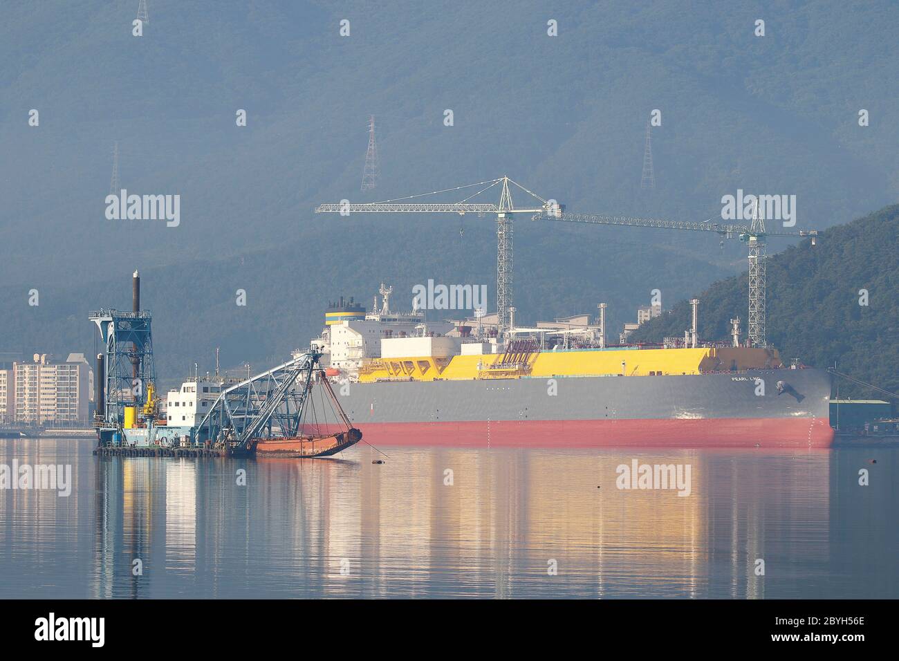 June 10, 2020, Geoje, GYEONGNAM, SOUTH KOREA: June 10, 2020-Geoje, South Korea- A View scene of Bulk carrier commissioning for deliver vessel near Daewoo Shipbuilding Marine Engineering Company (DSME) Shipbuilding yard in Geoje, South Korea. Korea Shipbuilding & Offshore Engineering Co., the shipbuilding holding company of South Korea's Hyundai Heavy Industries Group, said Tuesday it has won a 90 billion-won (US$75 million) order to build two petrochemical carriers. The two 50,000-ton vessels will be built by Hyundai Mipo Dockyard Co., a subsidiary of Korea Shipbuilding, starting October this Stock Photo