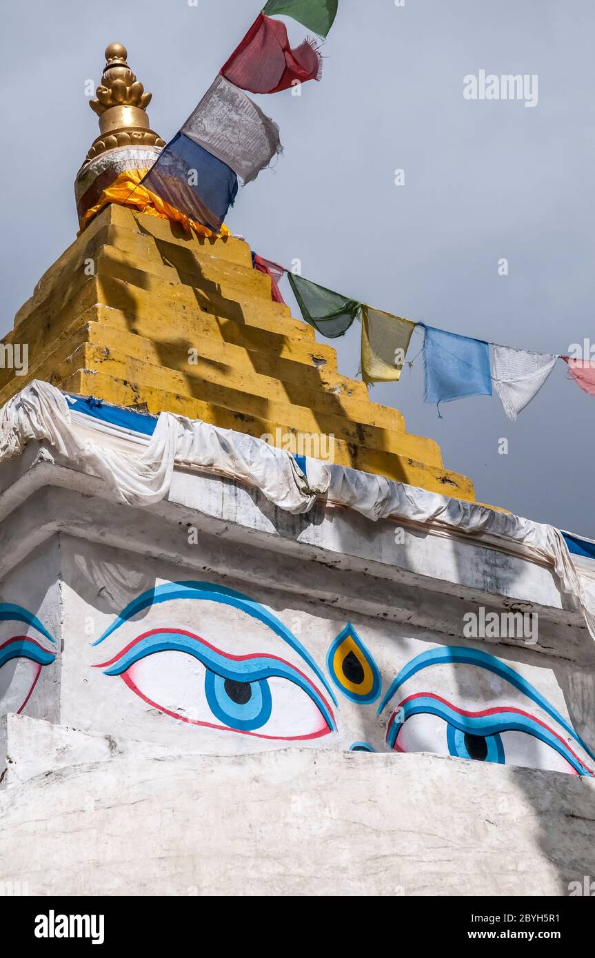 Nepal. Island Peak Trek. Colourful street scenes in and around the Solu Khumbu main trading and Sherpa town of Namche Bazaar with the towns main Chorten temple and the all seeing eyes of Buddha Stock Photo
