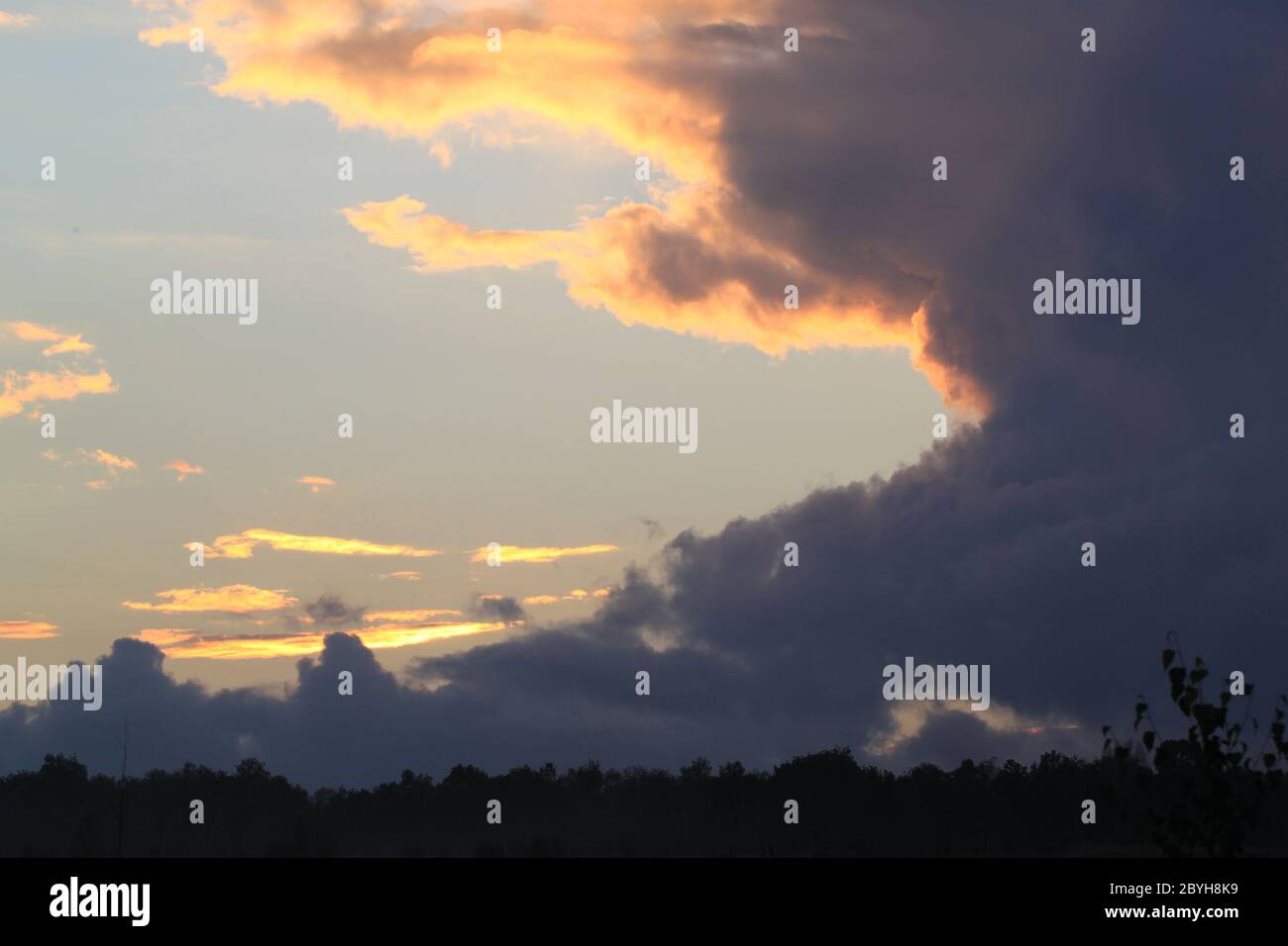 Dark clouds in evening hi-res stock photography and images - Alamy