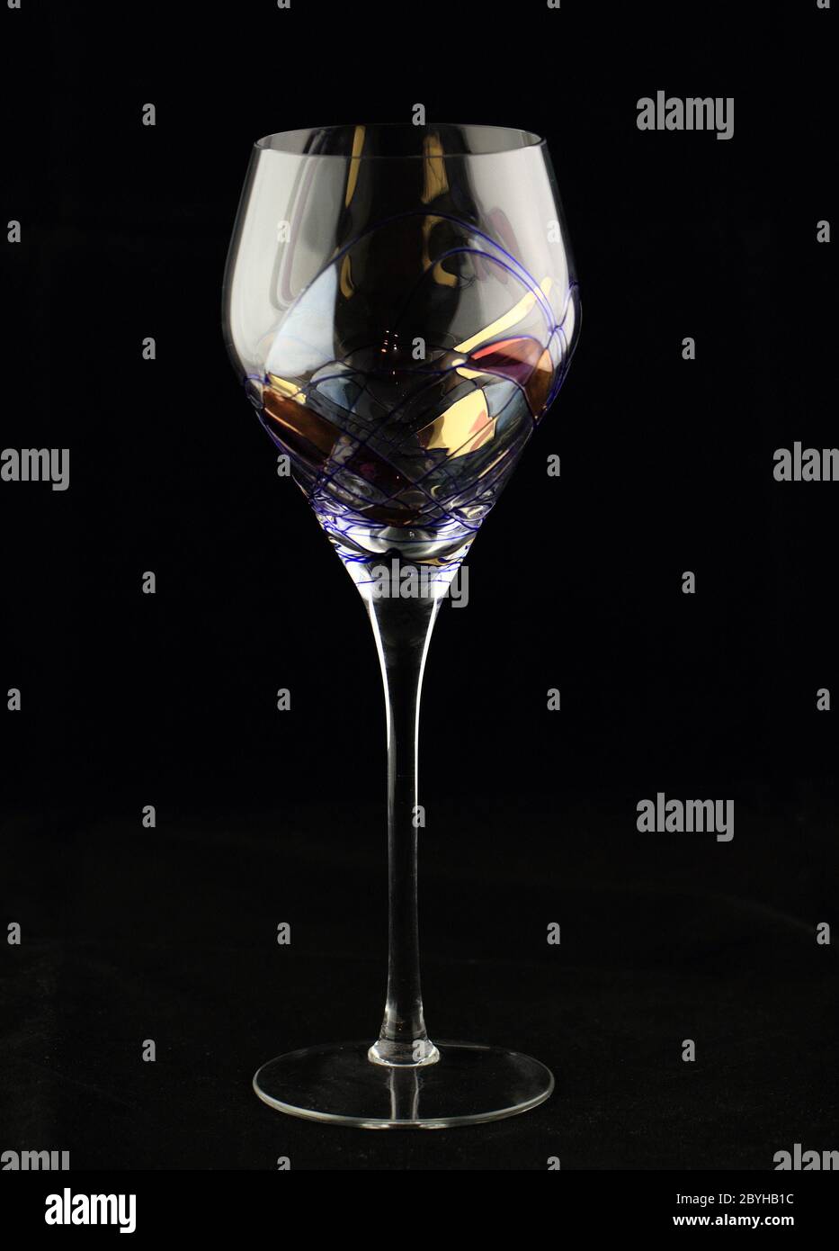 https://c8.alamy.com/comp/2BYHB1C/empty-wine-glass-on-dark-background-2BYHB1C.jpg