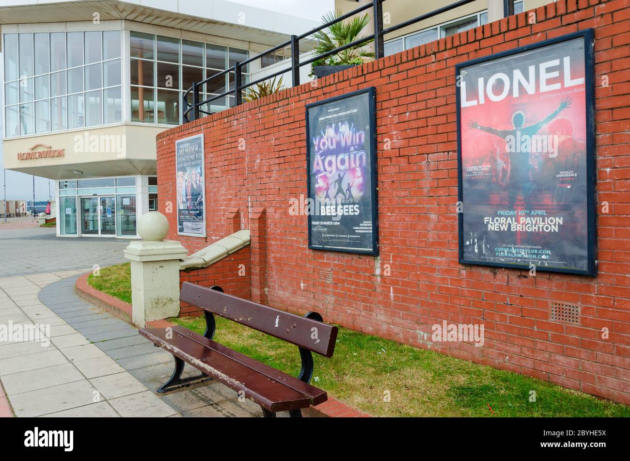 New Brighton, UK: Jun 3, 2020:Out of date posters advertise shows which never went ahead at the temporarily closed Floral Pavillion theatre and confer Stock Photo