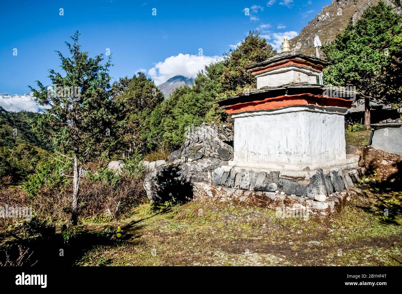 Nepal. Island Peak Trek. Bhuddist Chorten Stupa with Mani Prayer Stones  engraved with the Buddhist mantra of om mani padme hum en-route to Thyangboche Monastery Stock Photo
