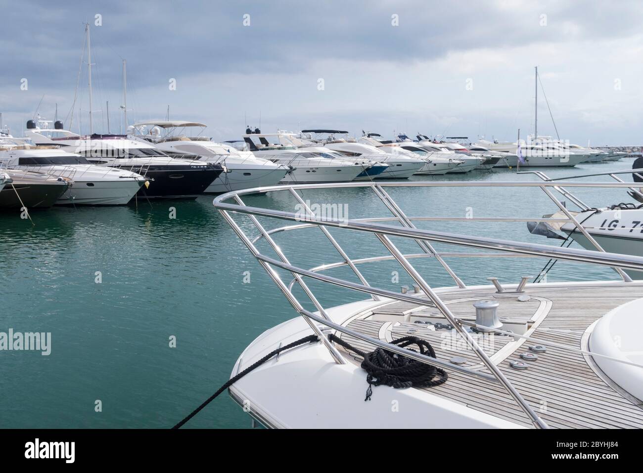 Motor Yachts moored in marina Marbella Spain Stock Photo