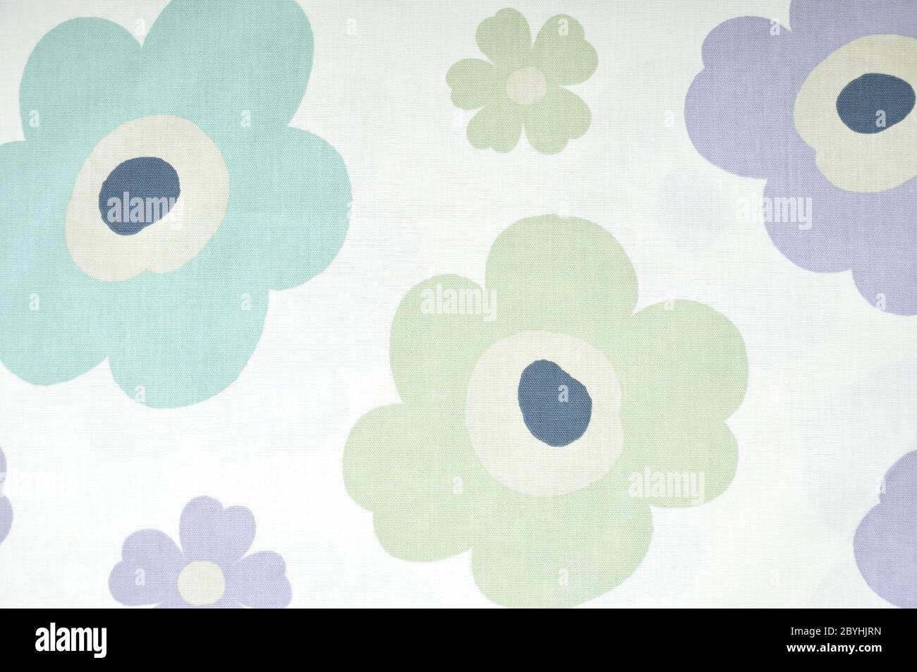 Fragment of colorful retro textile pattern with floral ornament useful as background. Stock Photo