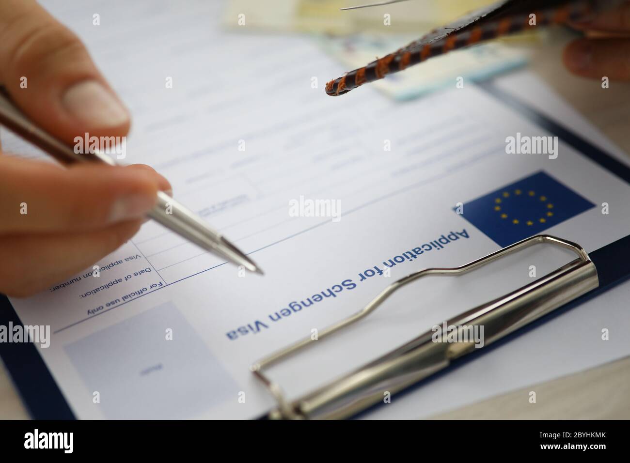 Focus on mans hand Stock Photo