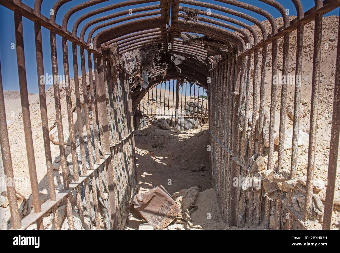 Remains of an old abandoned military army underground bunker dugout in the desert of africa Stock Photo
