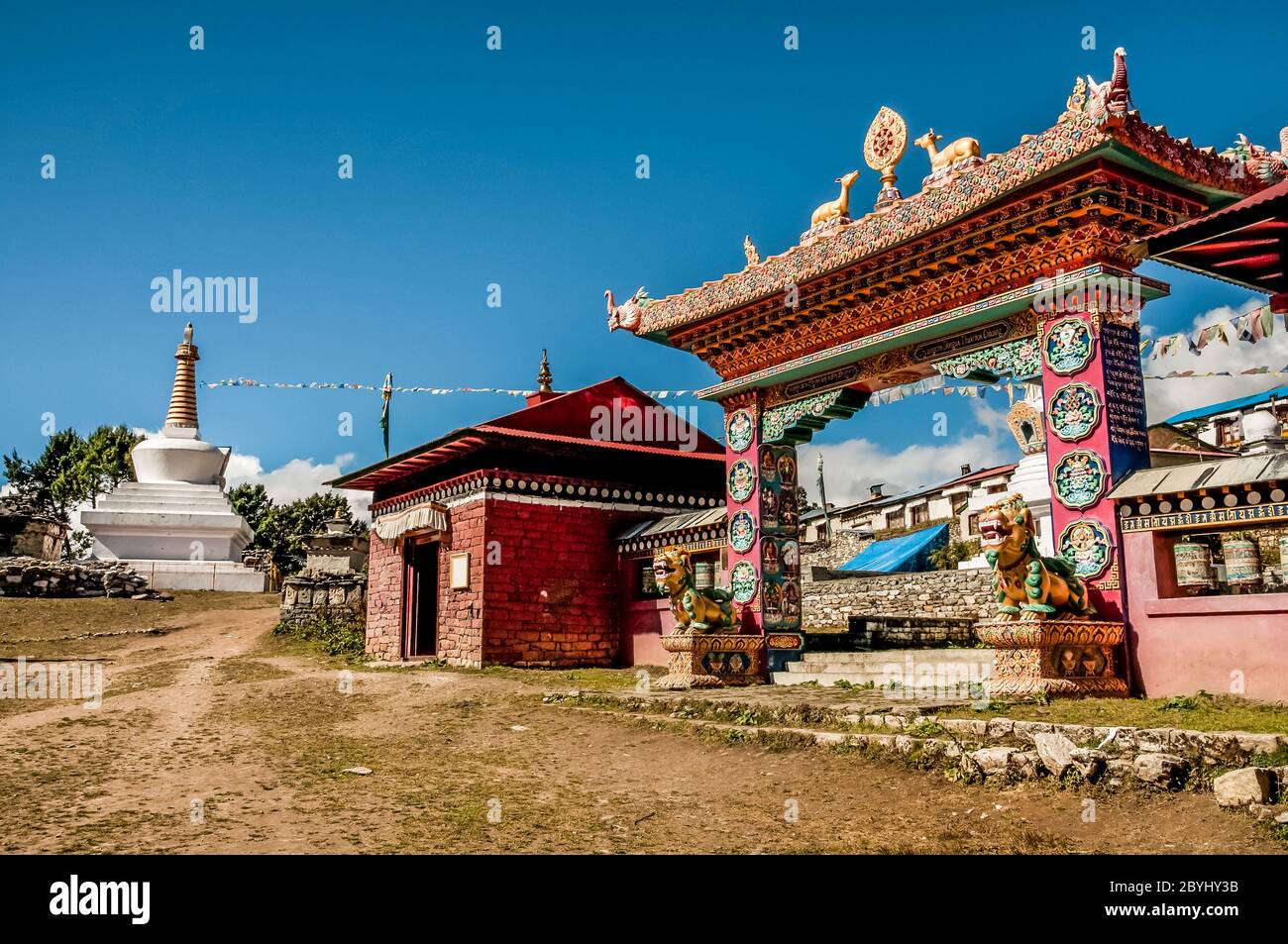 Nepal. Trek to Island Peak. Colourful scenes in and around the Thyangboche Buddhist Monastery with the archway and portal leading to the monastery complex Stock Photo