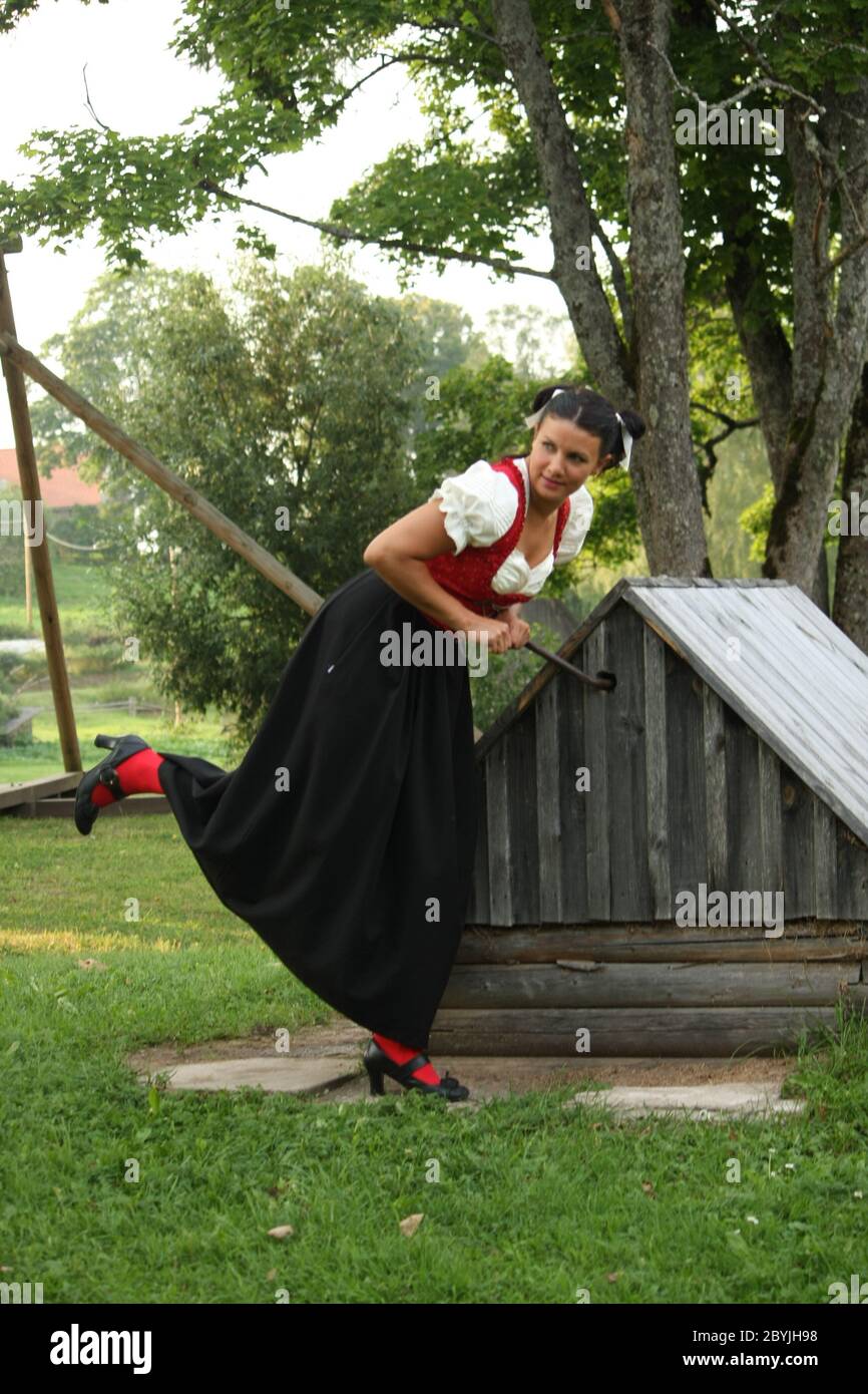 Female in countryside beautiful nature traditional Austrian dress Stock Photo