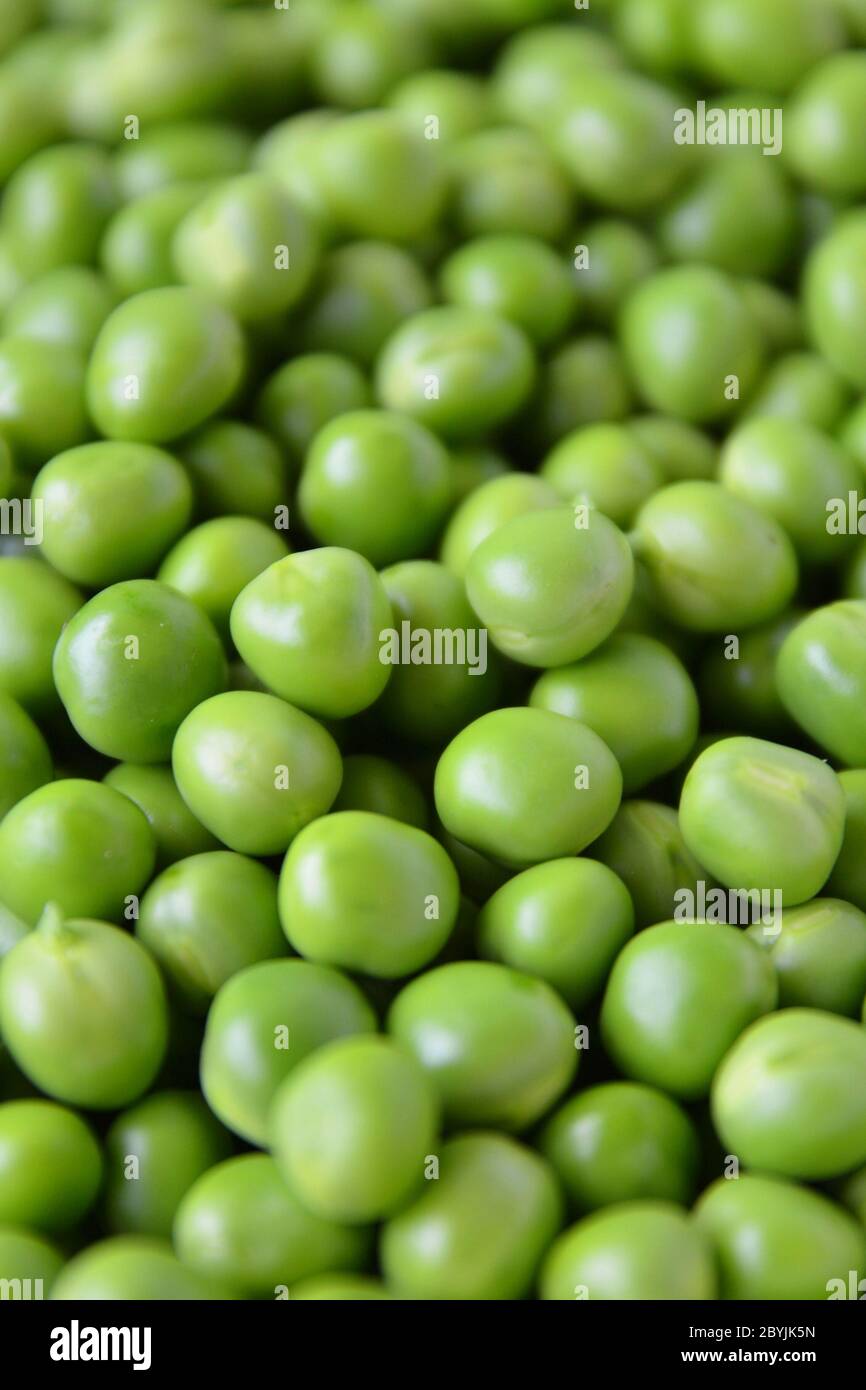 Fresh Green Peas Background, green background, vegetable. Stock Photo