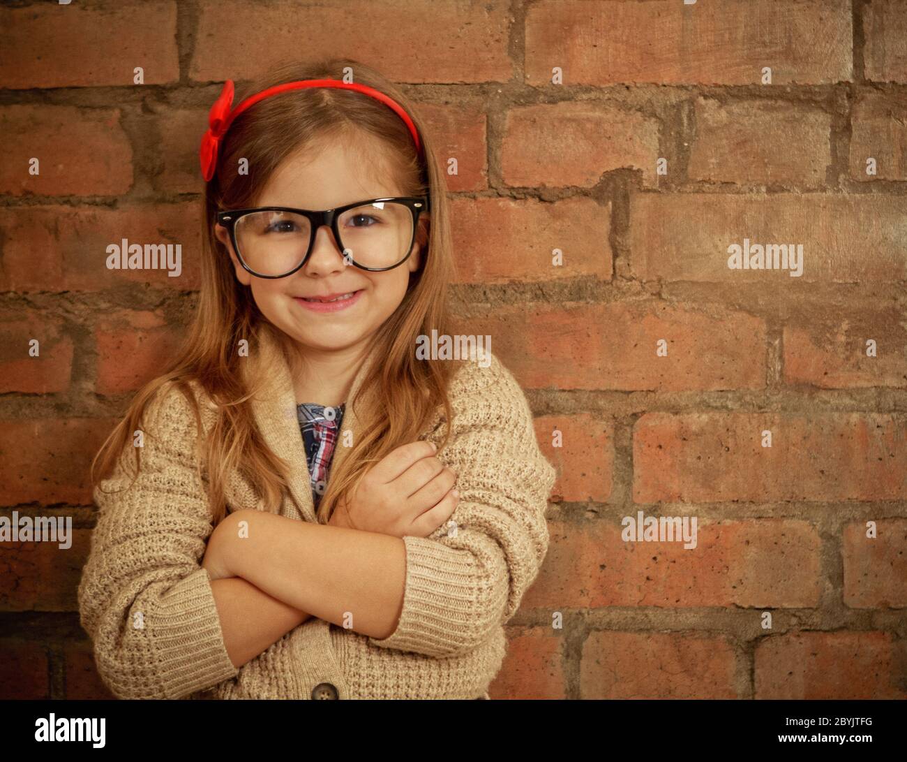 Funny little girl with glasses Stock Photo Alamy